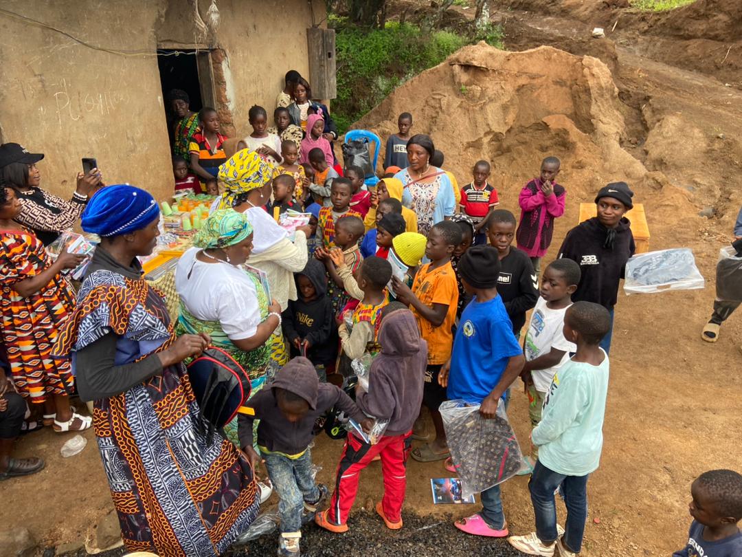 Children gather for the outreach in the village